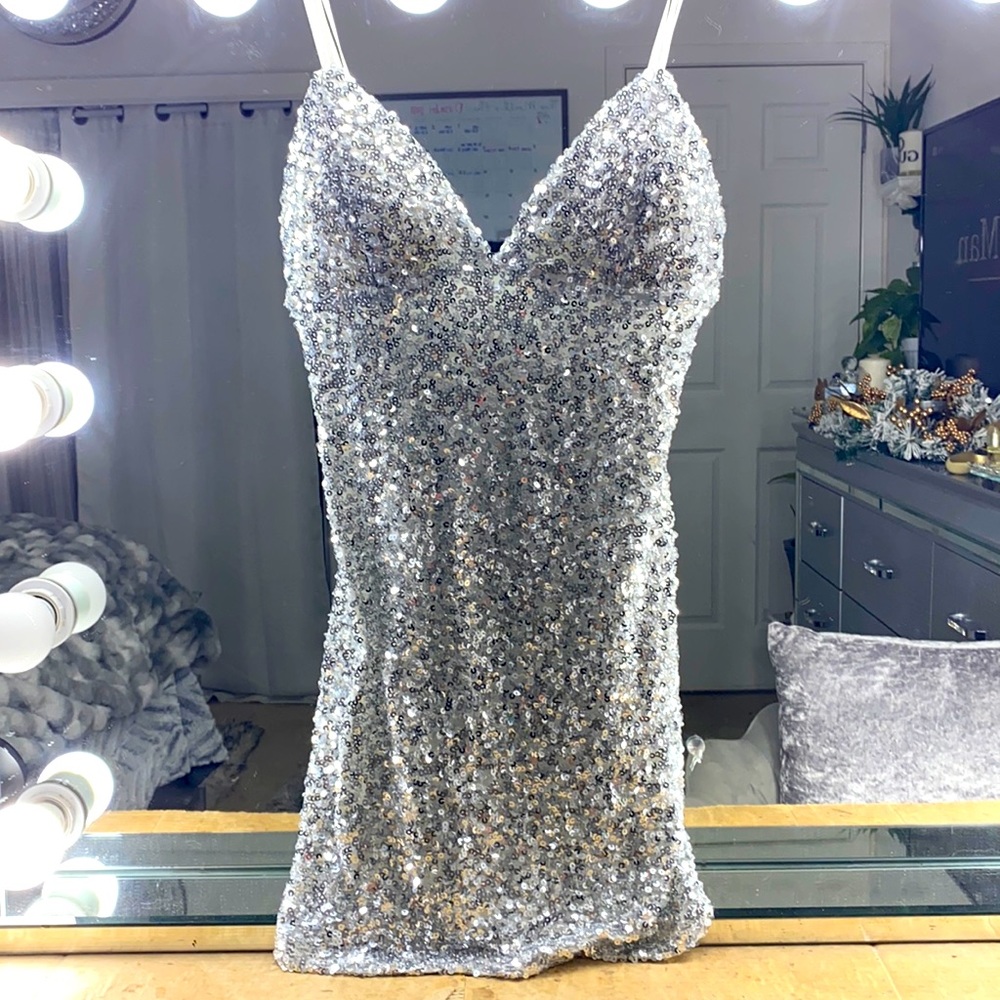 Silver, sequined dress